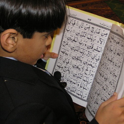 Young-student-finishing-Quran